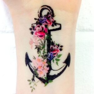 colorful ancre tattoo on wrist