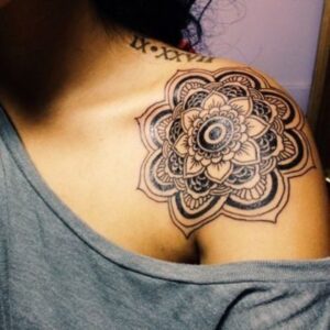 lotus flower on shoulder