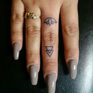 tiny hand tattoos for women