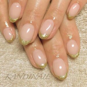 Golden Tips on Almond Shaped Nails