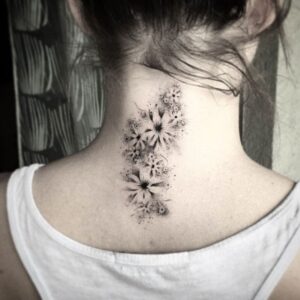 Flower chain back of neck tattoo