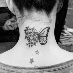 Butterfly back of neck tattoo
