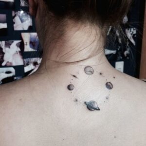 Planets back of neck tattoo