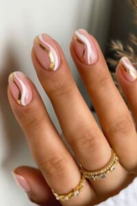 Pink Nails with Gold Stripes