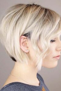 Short Blonde Cut + Long Side Bangs