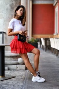 How To Wear White Sneakers With a Skirt