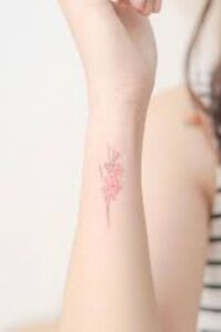 gladiolus tattoo on wrist