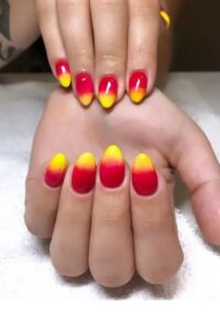 Short Almond Pink And Yellow Nails