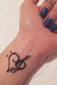 music note tattoo with heart