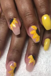 Pink And Yellow Nails With Sunflower
