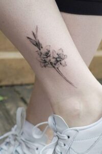 ankle gladiolus tattoo