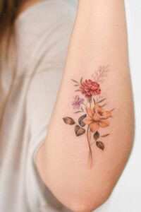 Colorful Carnation Tattoo on Forearm