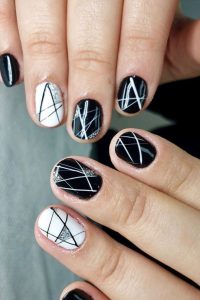 Asymmetrical Stripes Nails