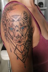 Lioness Shoulder Tattoo