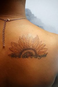 Subtle Sunflower Tattoo