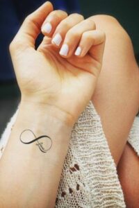 Infinity Symbol Tattoos, chic tattoo, elegant tattoo, elegant tattoos for women, chic tattoo design, elegant tattoo ideas